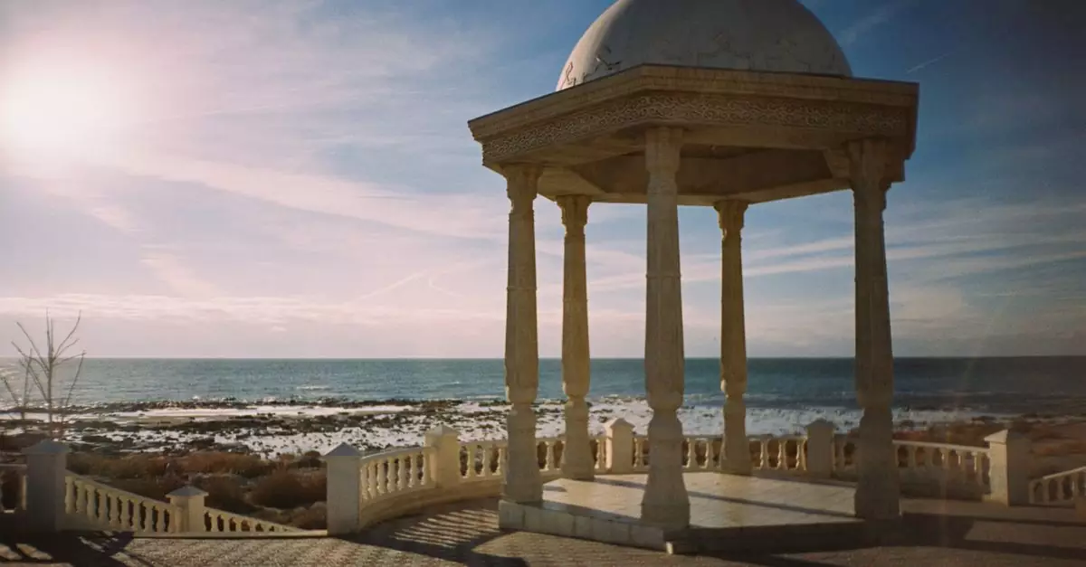 Beautiful gazebo overlooking the Caspian Sea, capturing serene Akatu coastal architecture under a vibrant sky.