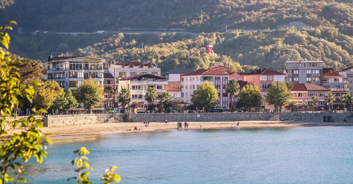 Picturesque view of Amasra's coastal architecture set against lush hillsides.