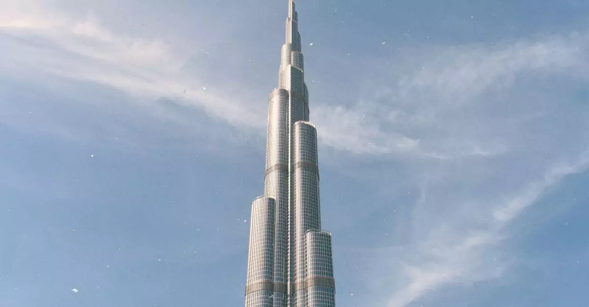 Tallest building in the world, the Burj Khalifa stands majestically against a clear blue sky in Dubai.