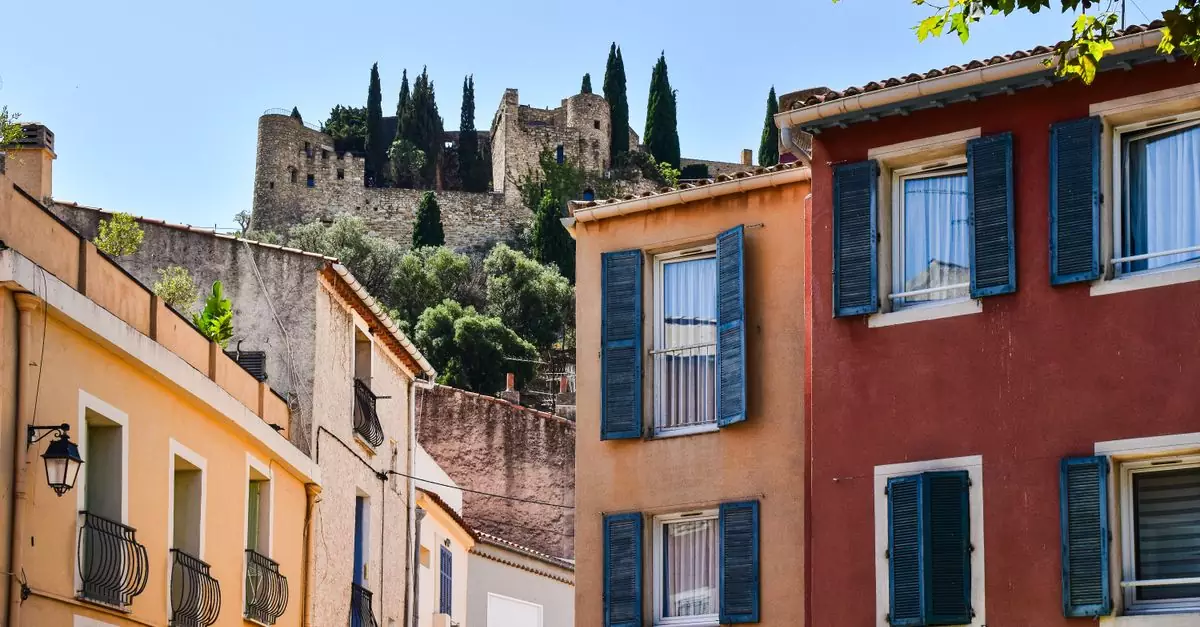 Explore the vibrant architecture and historic castle of Cassis, Provence, France.