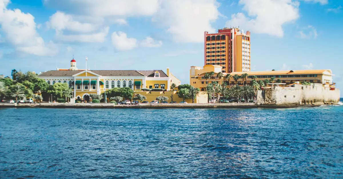 Colorful architecture along the Willemstad waterfront, highlighting Curaçao's unique urban landscape.