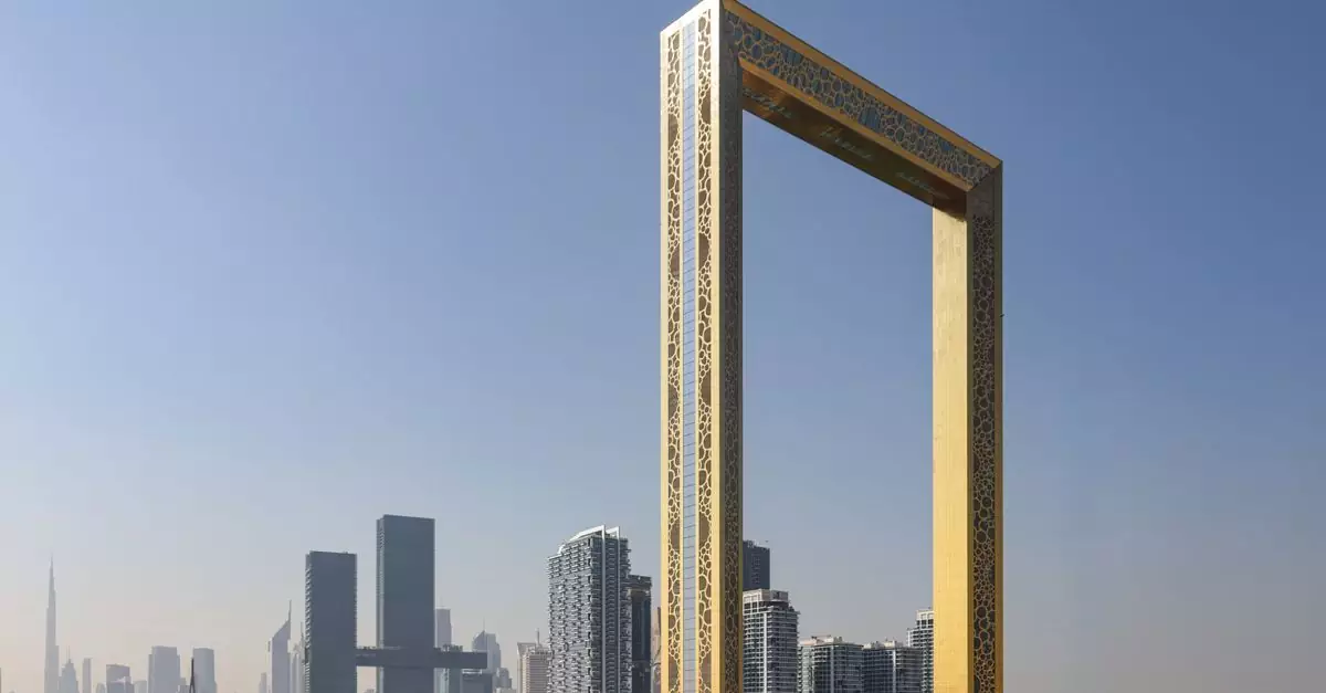 A breathtaking view of Dubai's modern skyline with the striking Dubai Frame in the foreground.