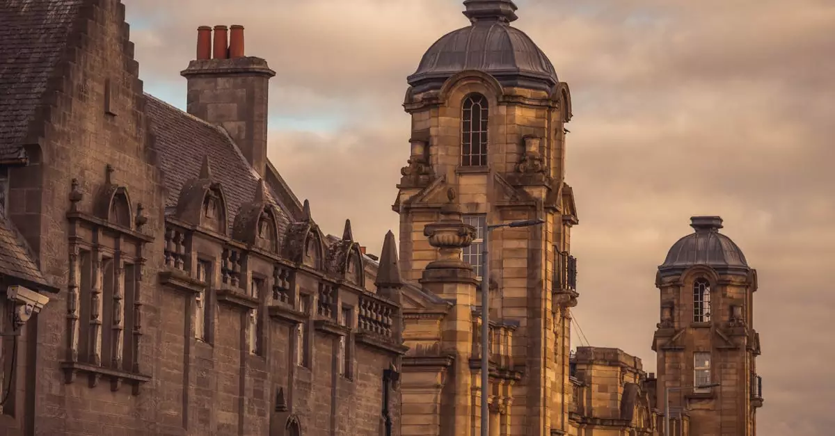 Dramatic view of old European buildings under a warm sunset sky.