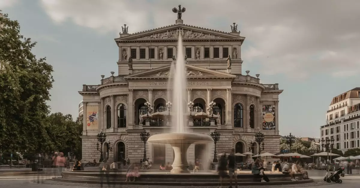 The striking Alte Oper in Frankfurt am Main with a prominent fountain and bustling atmosphere.