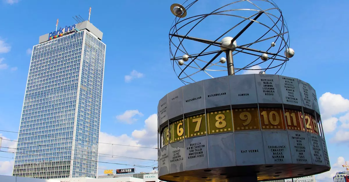 World Clock and Park Inn in Berlin's Alexanderplatz against a clear sky.