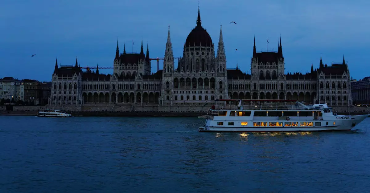 Visitors enjoy a scenic cruise by Budapest's Parliament building at dusk, under a soft blue sky.
