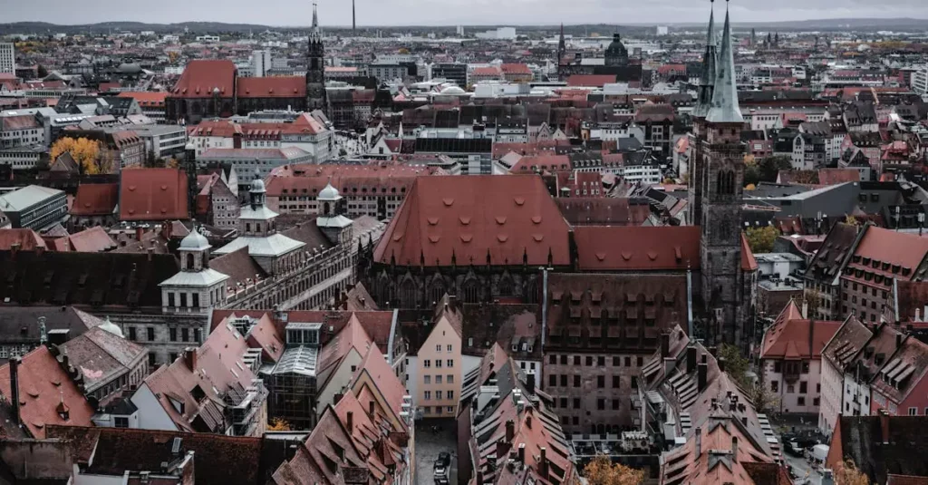 Aerial view of Nuremberg, Germany showcasing its historic architecture and vibrant cityscape under cloudy skies.