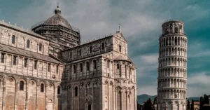 Beautiful view of the Leaning Tower and Pisa Cathedral in sunny Italy.