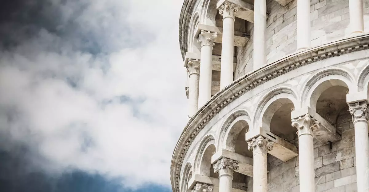 Close-up of the iconic Leaning Tower of Pisa showcasing its architectural details and columns.