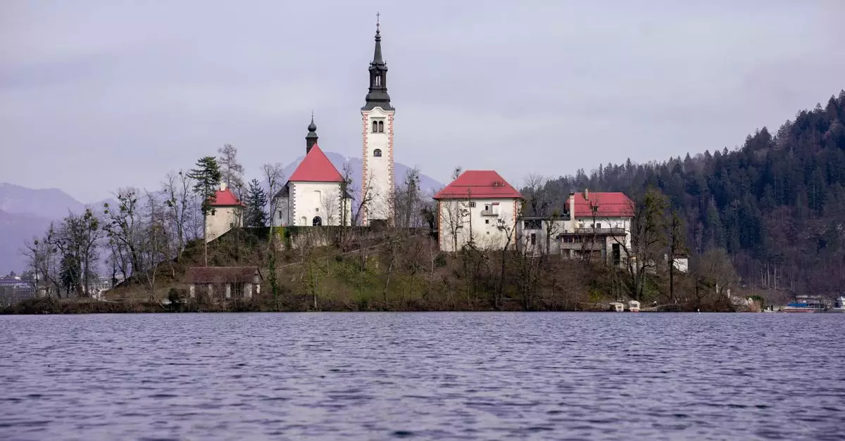 Scenic view of Bled Island with the church and Bell Tower on Lake Bled, Slovenia.