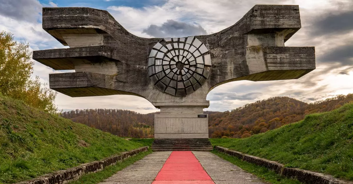 Spomenik revolucije at Podgarić in Croatia under a dramatic sky.