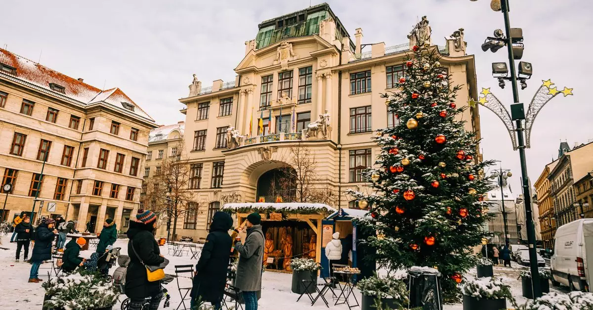 A winter Christmas market in Prague with a decorated tree and historical buildings under a cloudy sky.