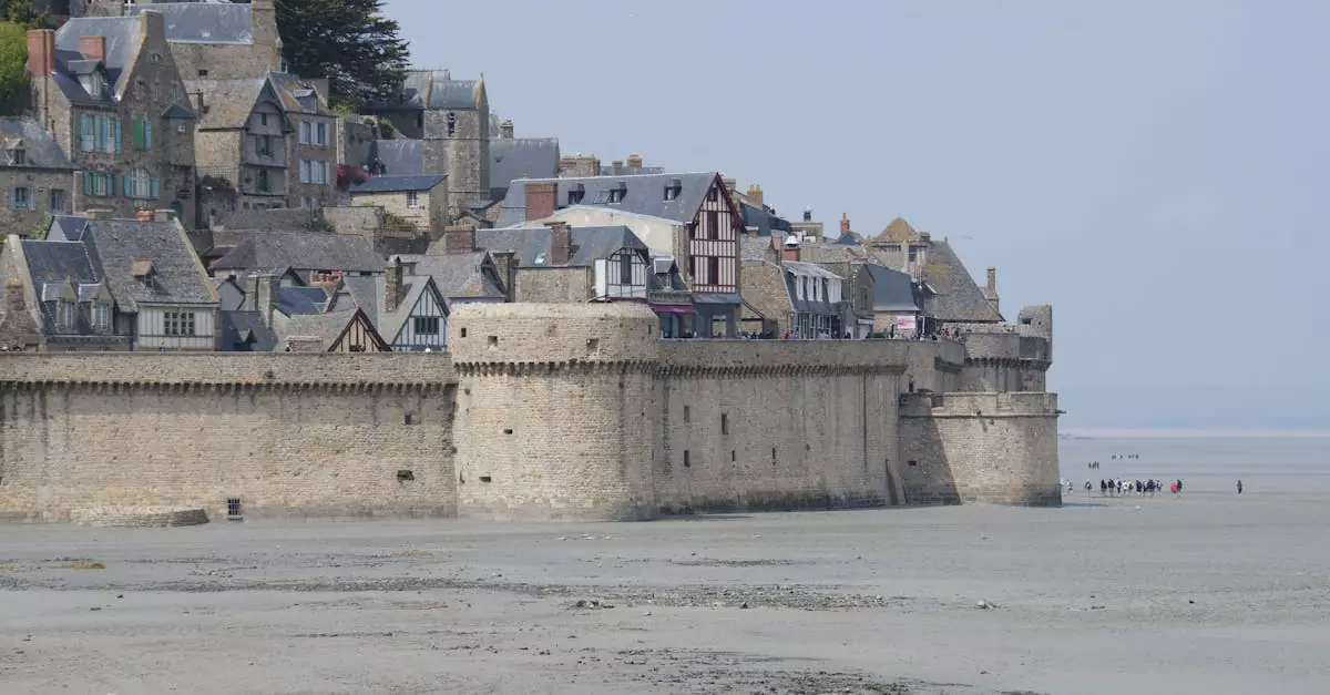 Scenic view of Mont Saint-Michel's medieval architecture, showcasing historical French heritage.