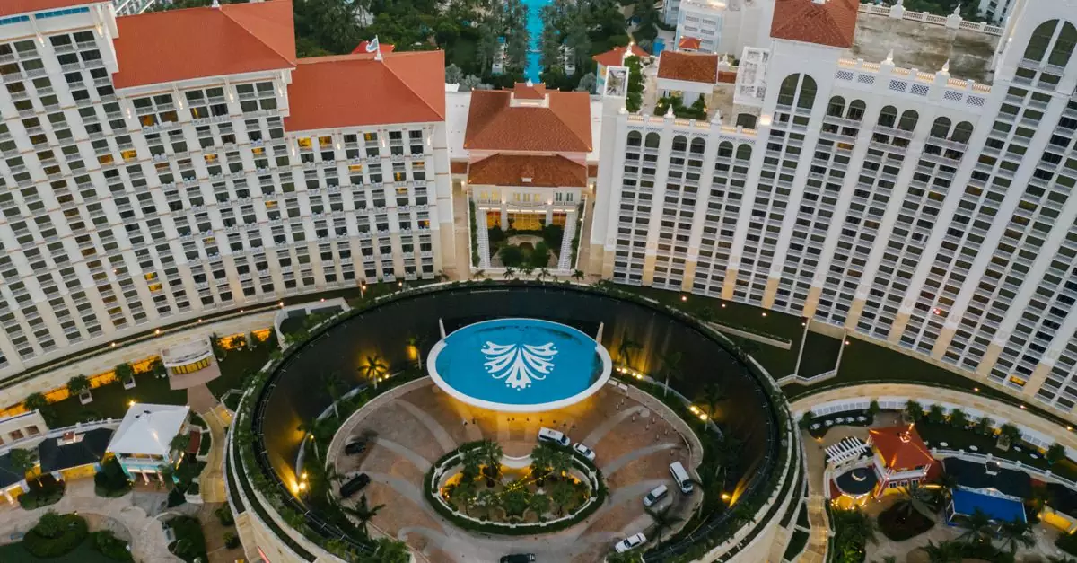 Captivating aerial view of a luxury resort in Nassau, Bahamas, highlighting its grand architecture and lush surroundings.
