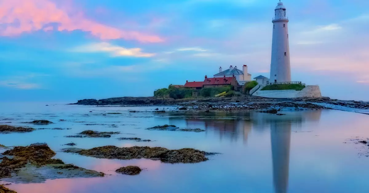Beautiful evening view of St Mary's Lighthouse reflecting in the sea at Whitley Bay.
