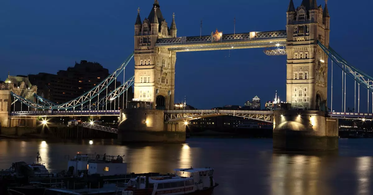 A stunning night view of London's Tower Bridge illuminated over the River Thames.