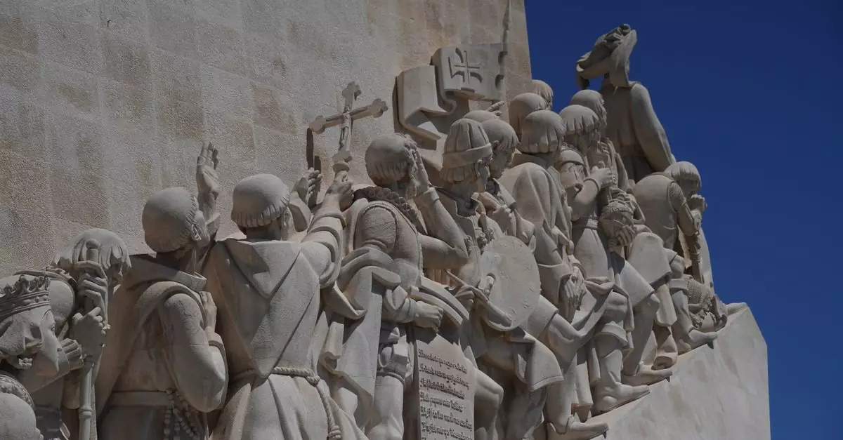 Detailed view of historical stone carvings on a famous landmark in Lisbon, Portugal.
