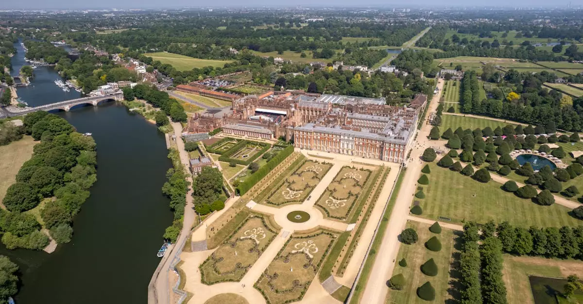 Stunning aerial view of Hampton Court Palace and its gardens in Molesey, England.