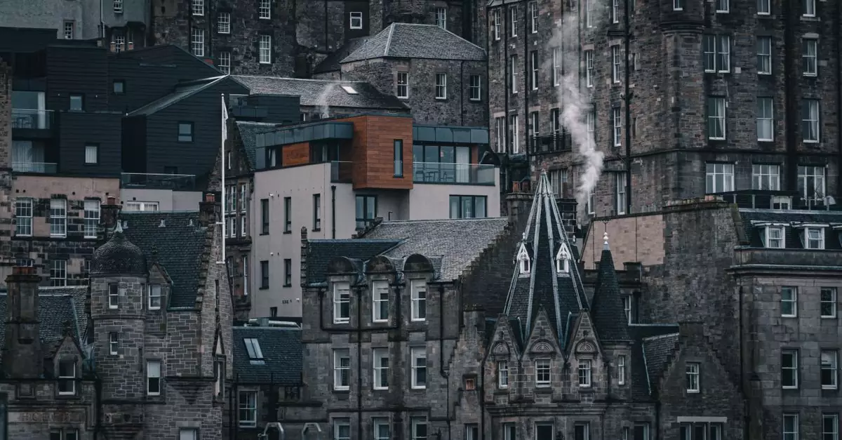 A scenic view showcasing the blend of gothic and modern architecture in Edinburgh, Scotland.