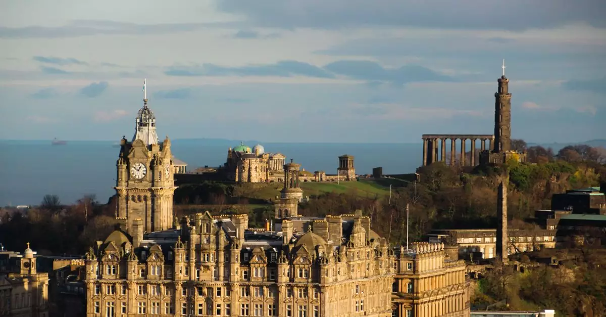 Aerial view of Edinburgh featuring The Balmoral Hotel and historic Calton Hill landmarks.