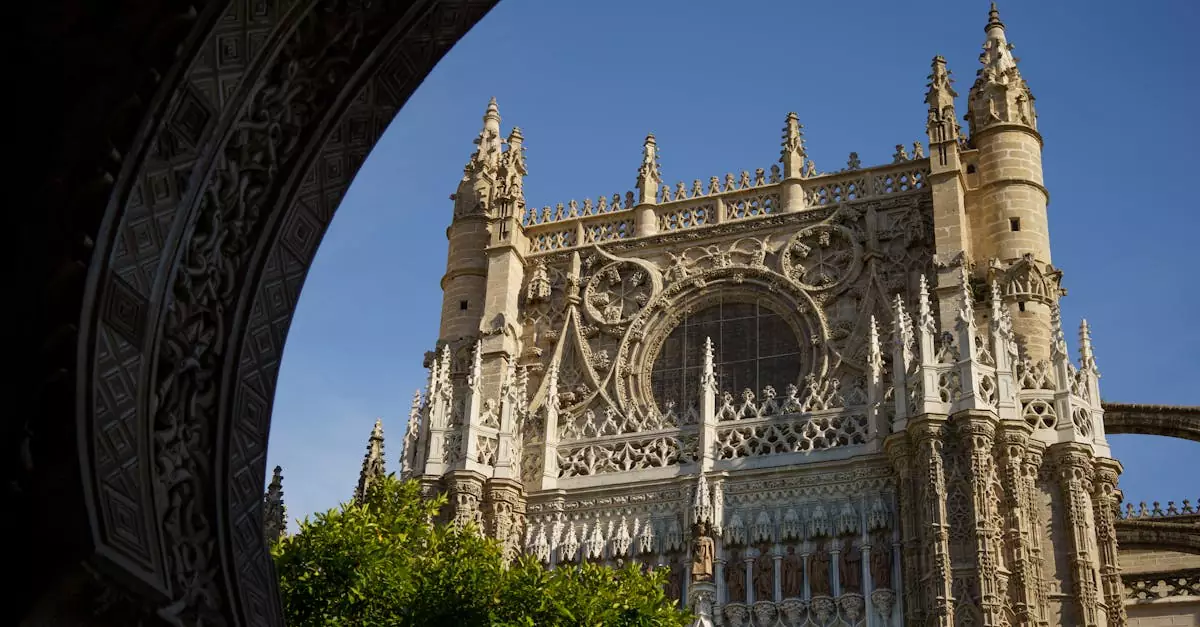 Explore the intricate gothic architecture of Seville Cathedral's facade with its stunning details.