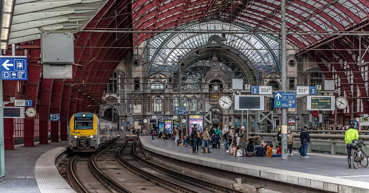 Bustling European train station with commuters and approaching train. Captivating architectural details.