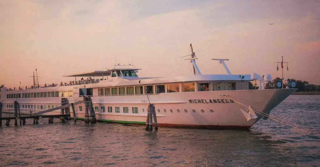 Elegant cruise ship Michelangelo docked at Venice during sunset, capturing the serene ambiance of the Venetian waters.