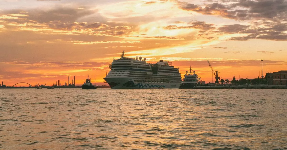 Silhouetted cruise ships against a vibrant Venetian sunset, showcasing the harbor's beauty.
