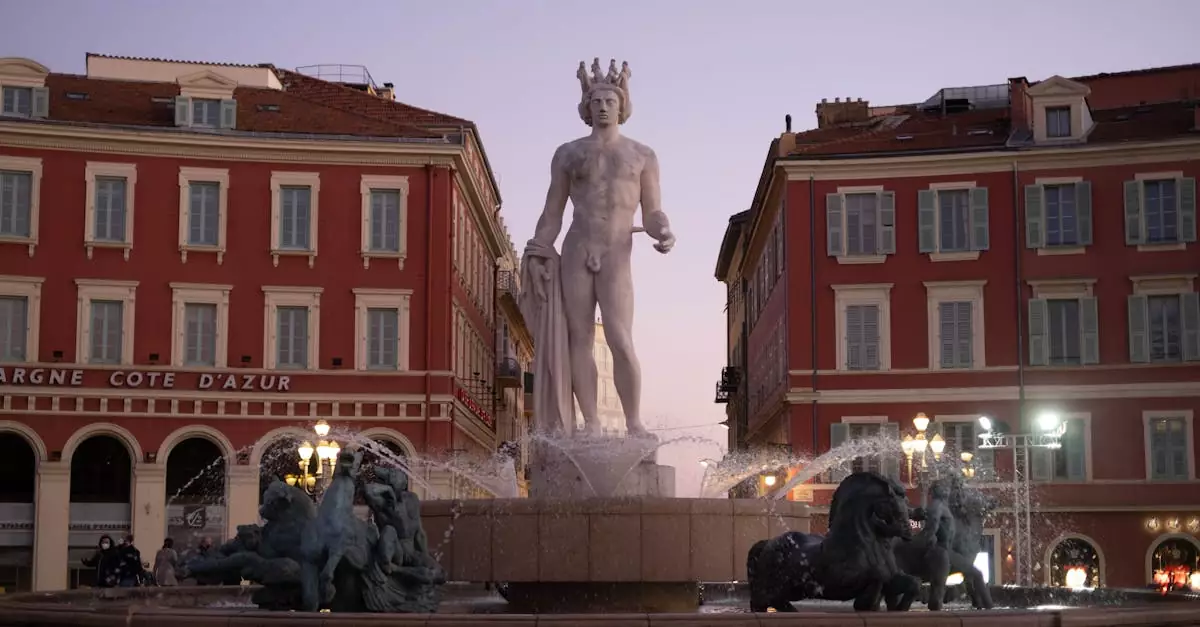 Explore the stunning Fontaine du Soleil in Nice, France, captured at twilight in Place Mass&eacute;na.