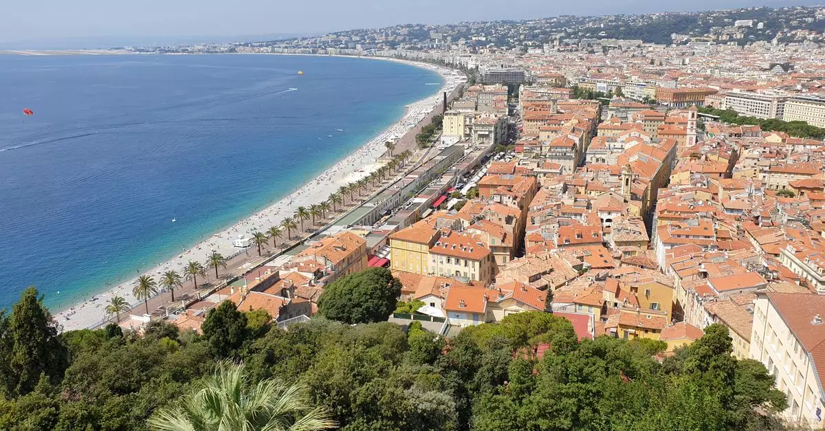 A stunning aerial view of Nice's coastline featuring the Promenade des Anglais and the Mediterranean Sea.